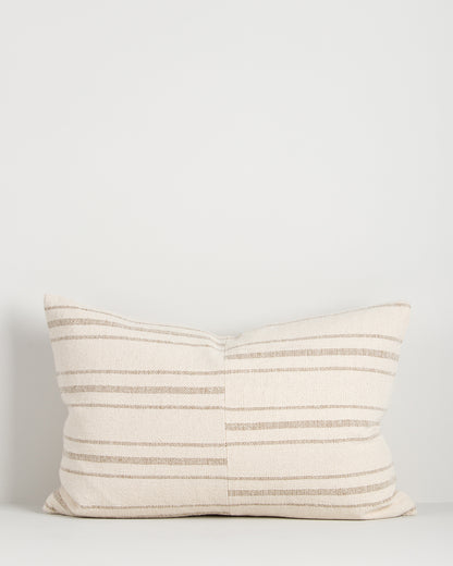 Striped pillow on a light gray background