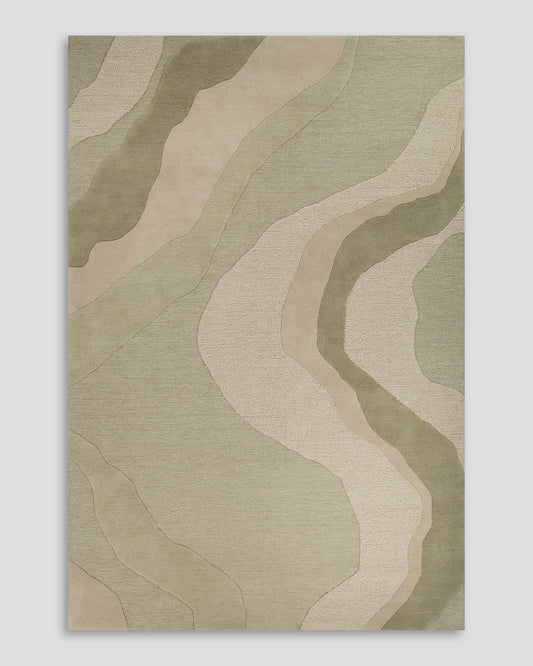 An abstract area rug with a topographic contour pattern in muted sage green, beige, and light tan tones, shown flat against a neutral light green background.