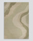 An abstract area rug with a topographic contour pattern in muted sage green, beige, and light tan tones, shown flat against a neutral light green background.