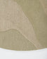 A close-up of a textured area rug with an abstract organic pattern in shades of beige and green, showing the pile texture and a white surface underneath.