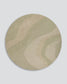 A round area rug with an abstract, layered topographic pattern in muted sage green and beige tones, shown against a neutral light gray background.