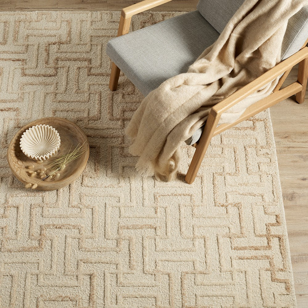 geometric patterned beige tuffted rug