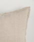 Beige pillow on a white background