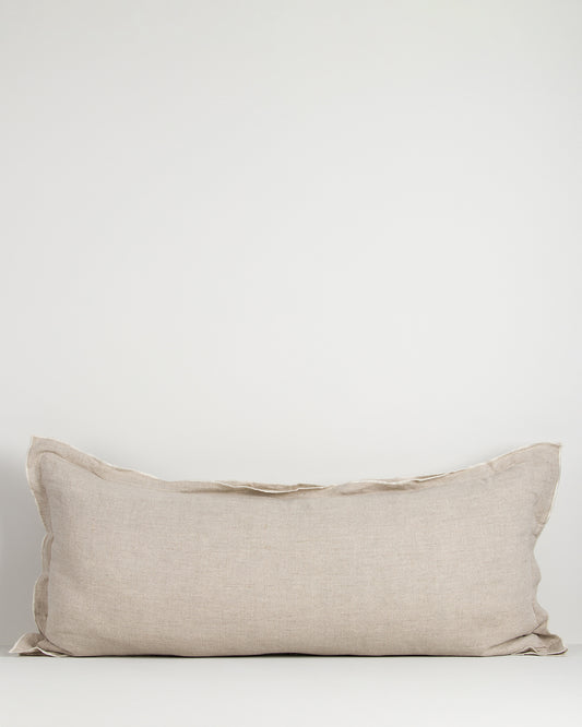 Beige lodge pillow on a white background