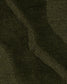 Close-up of a textured green fabric surface