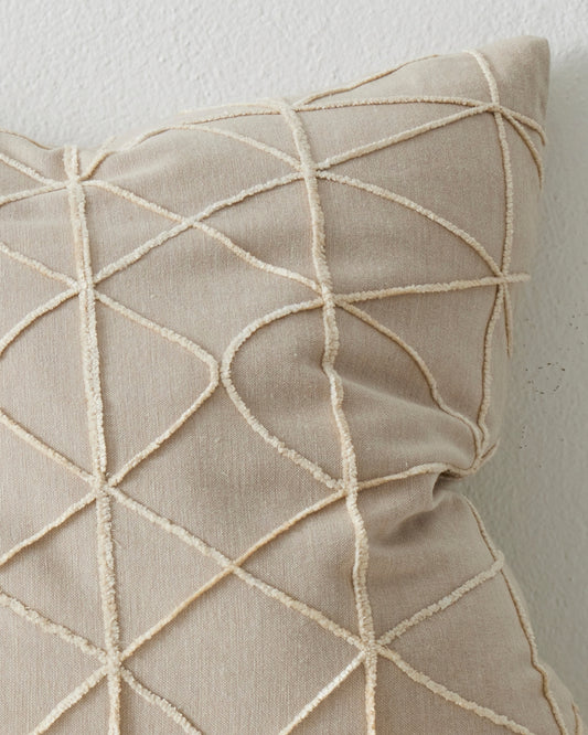 geometric patterned square cushion in cream