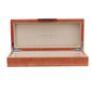 Orange textured jewelry box with 'Addison Ross London' branding on a white background