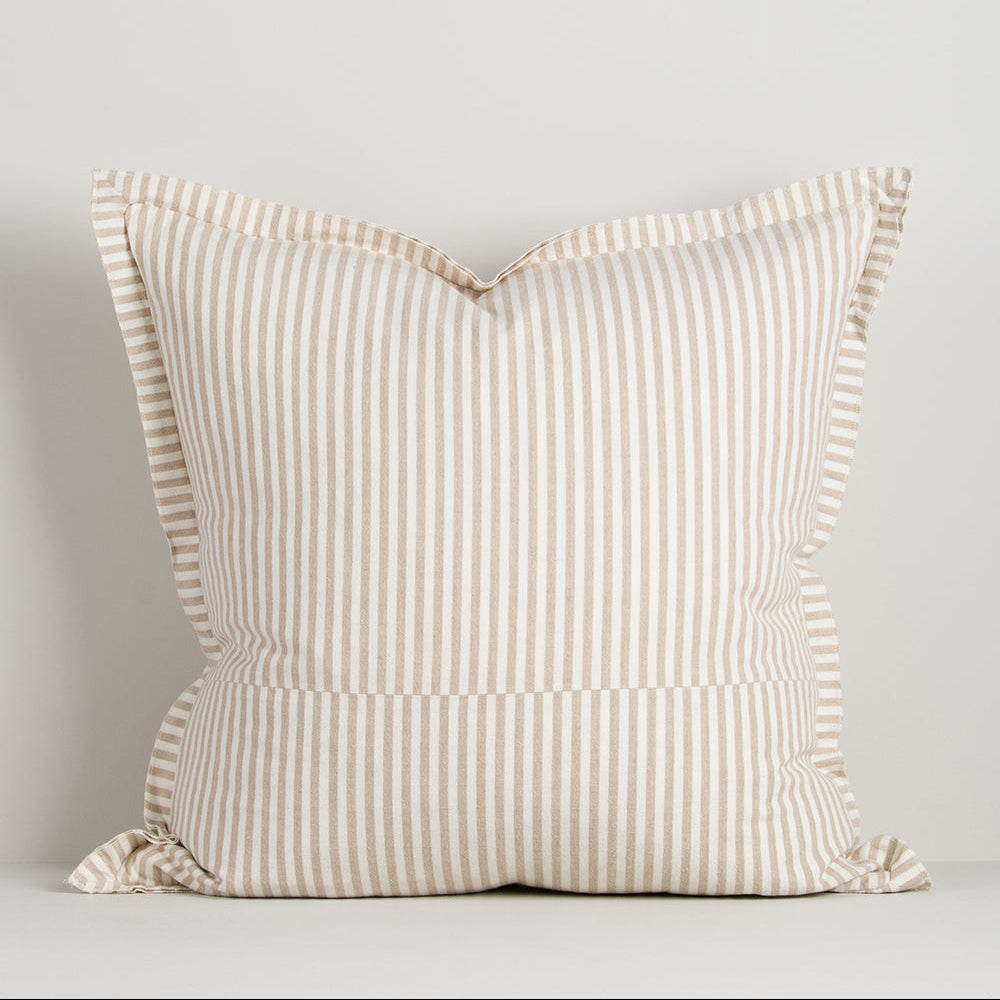 Striped pillow with flange on a light gray background