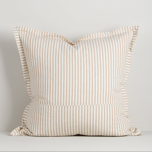 Striped pillow with flange on a light gray background