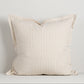 Striped pillow with flange on a light gray background