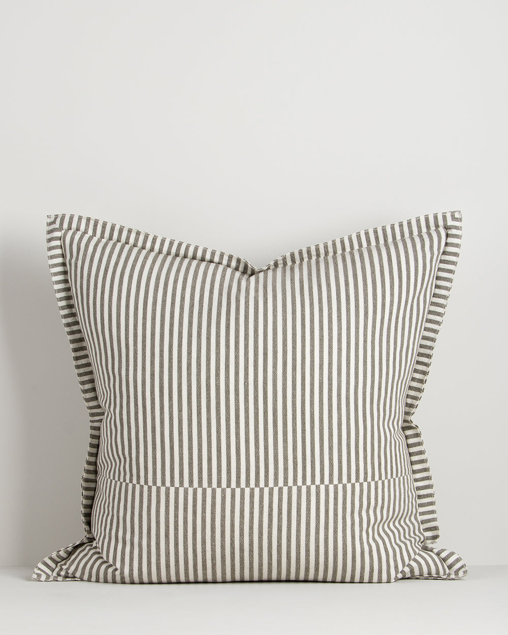 Striped pillow with a white background