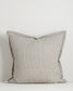 Striped pillow with a white background