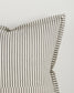Striped pillowcase with green and white stripes on a light gray background