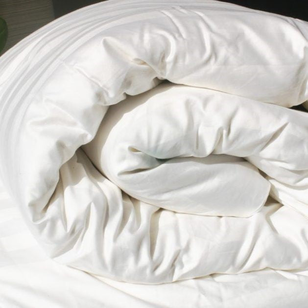 silk duvet rolled up