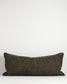 Dark gray pillow on a white background
