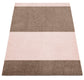 Rectangular rug with brown and pink stripes on a white background