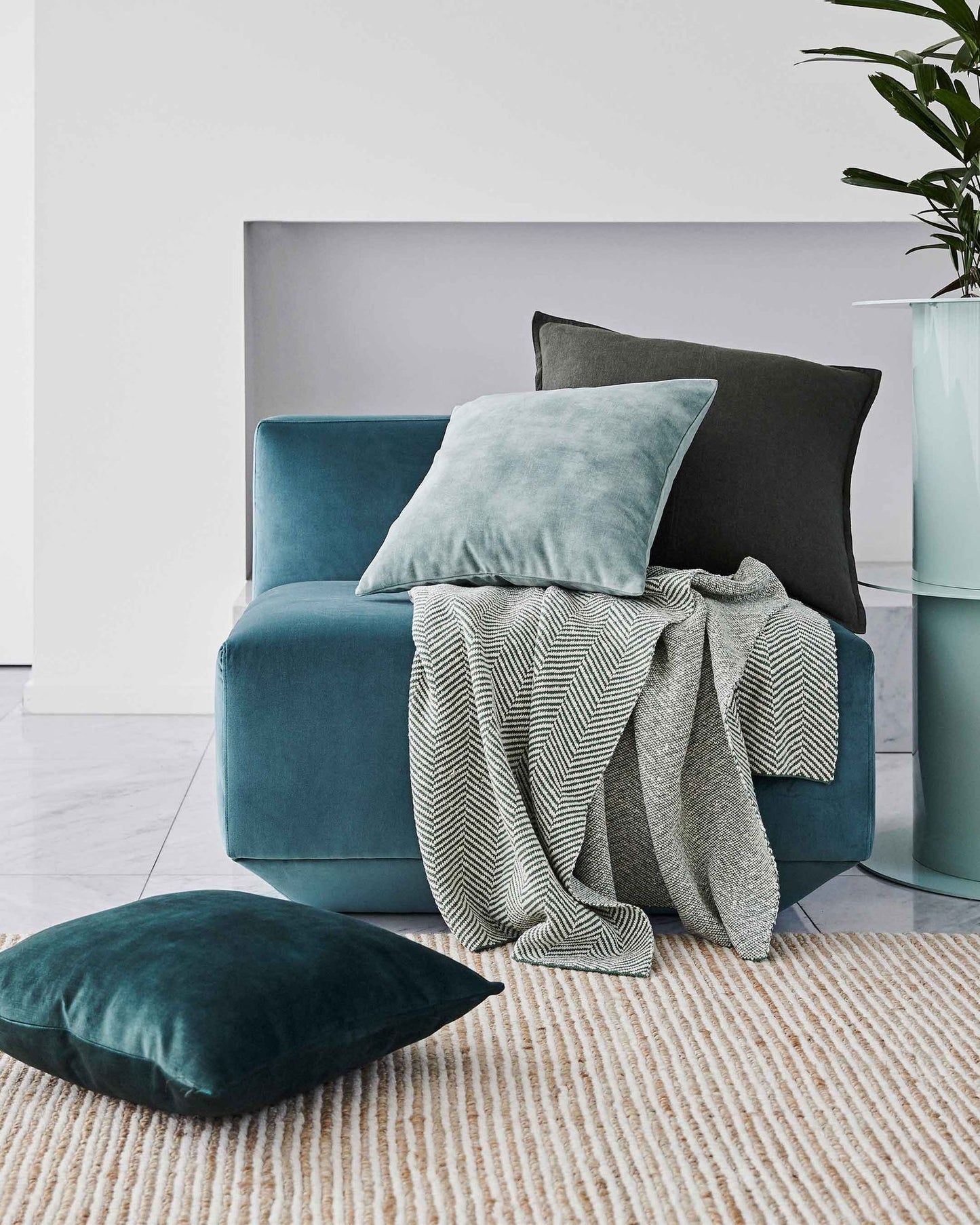 Ava cushion, velvet cushion from Weave Home, lifestyle shot with 4 coloured Ava cushions