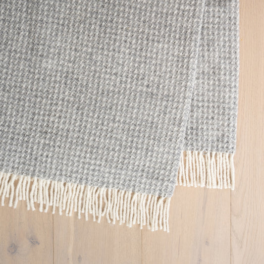 Breckon wool throw in fog by Weave Home