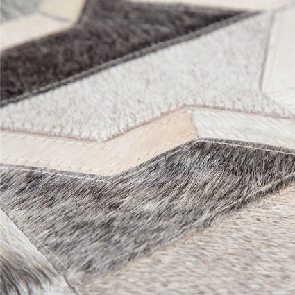 Corbit leather rug in grey and white and soft neutrals