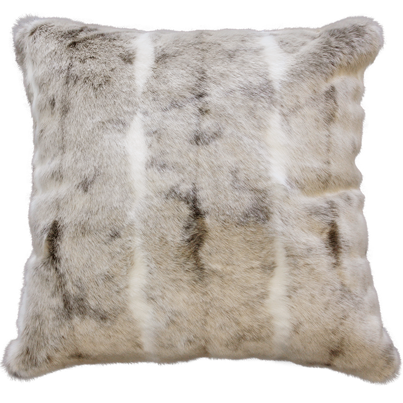Luxury faux fur mountain rabbit throw in cream and brown from Heirloom.  These are the best fake fur throws, super soft for NZ interior design