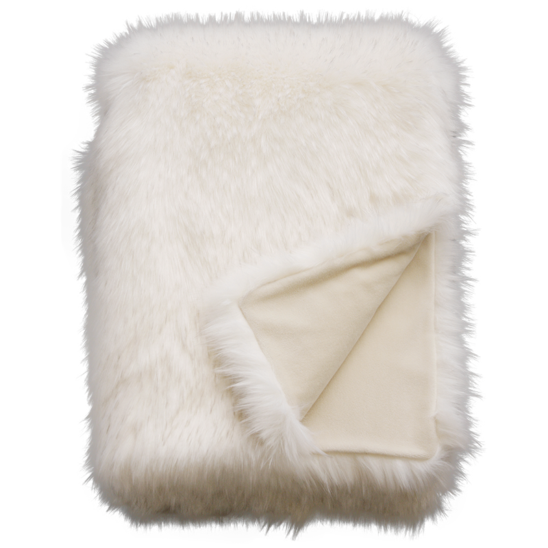Luxury faux fur Norwegian Fox cushion in pure white from Heirloom. These are the best fake fur throws, super soft for NZ interior design