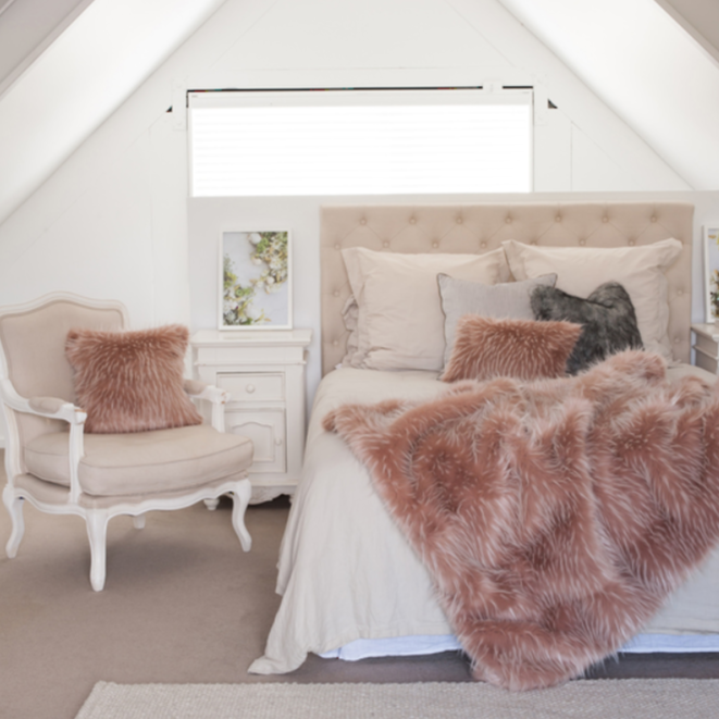 Luxury faux fur throw Peony Plume in pale pink from Heirloom.  These are the best fake fur throws, super soft for NZ interior design