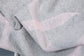 Cashmere and wool window pane throw from Foxford in pink and grey