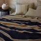 Franco linen throw on a bed in shadow