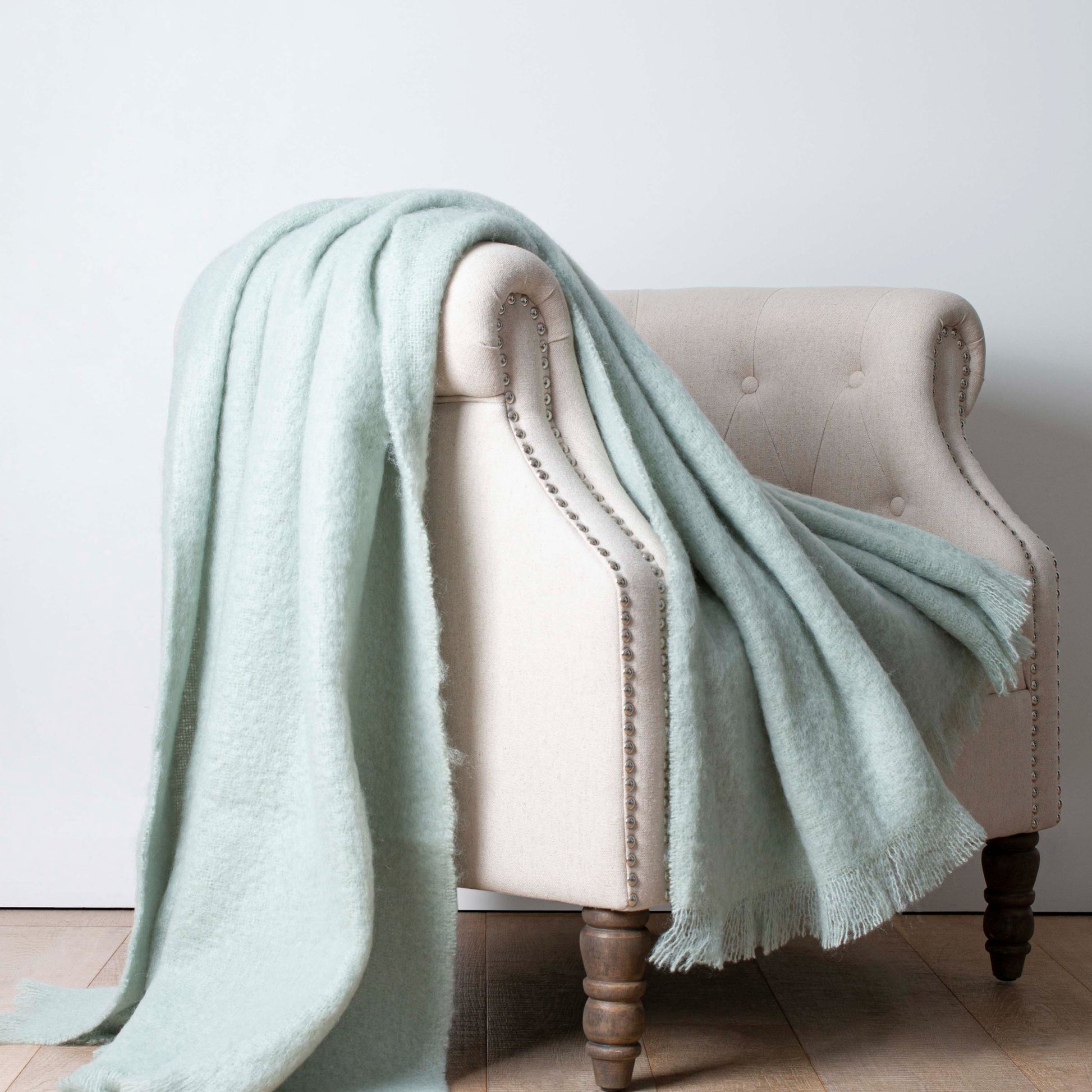 Soft Mohair luxury throws from Glamorous Goat.  Mohair throw in mint green  available at My Sanctuary