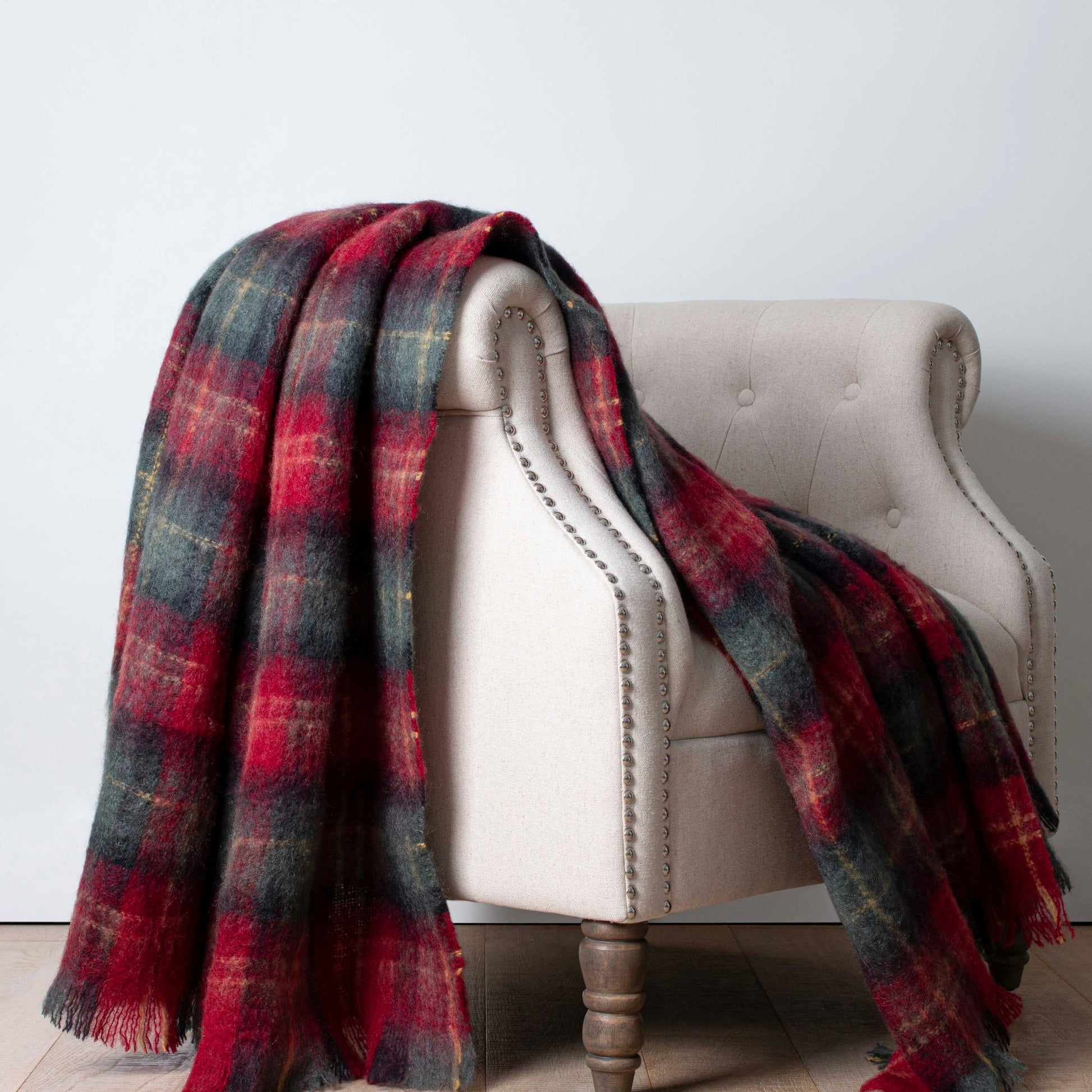 Soft Mohair luxury throws from Glamorous Goat.  Mohair throw in Cadrona red and green check available at My Sanctuary