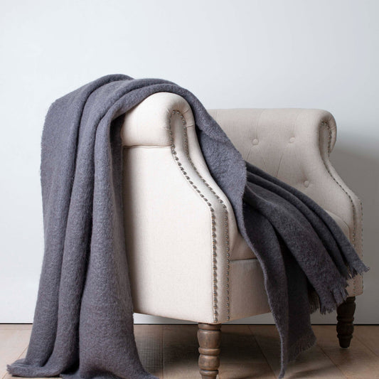 Soft Mohair luxury throws from Glamorous Goat.  Mohair throw in Charcoal available at My Sanctuary