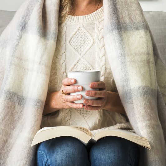 Soft Mohair luxury throws from Glamorous Goat in Wanaka Earth beige and grey chec. Angora kid mohair throws available at My Sanctuary