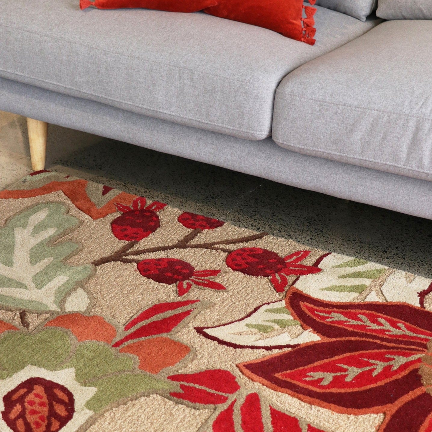 Hudson floral floor rug in green, red, rust, peach botanicals