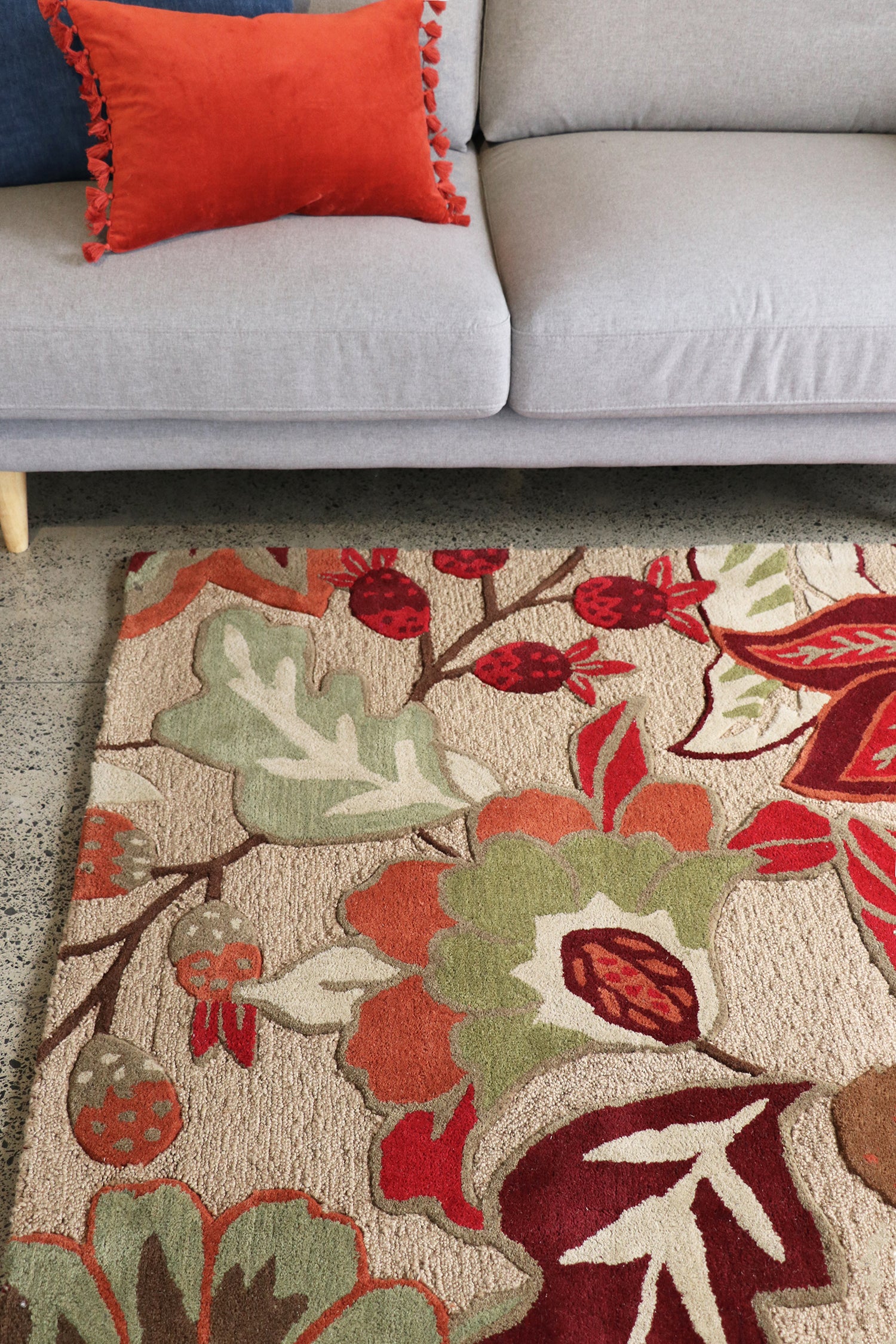 Hudson floral floor rug in green, red, rust, peach botanicals