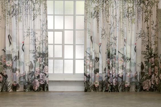 Mizu garden fabric panel from mokum featuring 2 cranes, pink peonies, wisteria and green bamboo and foliage in a serene water garden as curtains