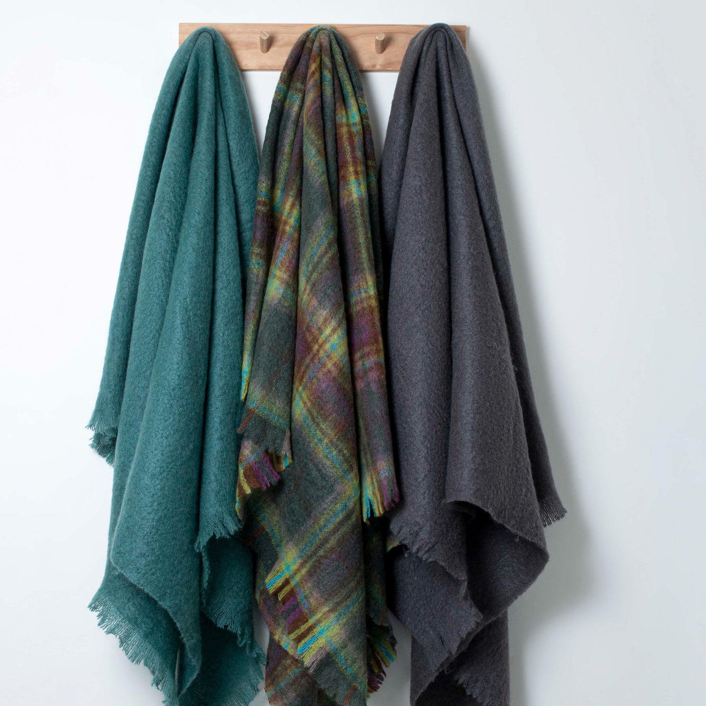 Soft Mohair luxury throws from Glamorous Goat.  Mohair throw in Aspiring Forest green and yellow check available at My Sanctuary