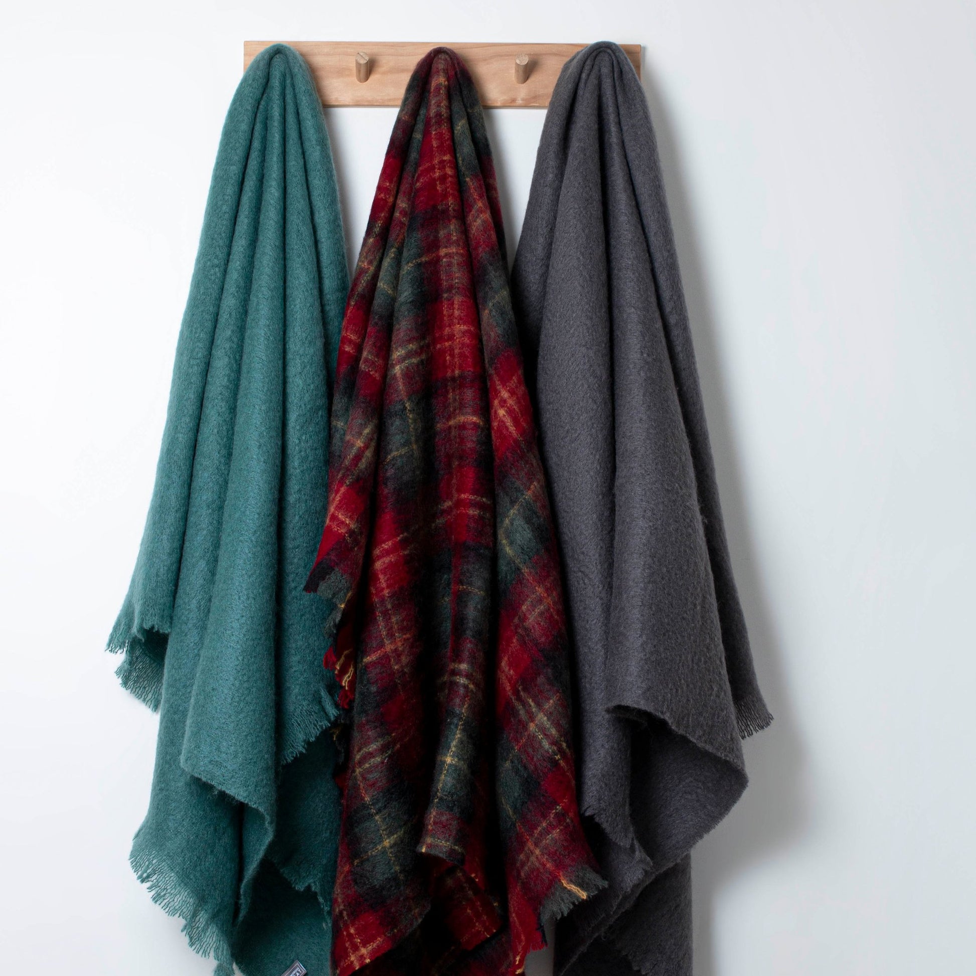 Soft Mohair luxury throws from Glamorous Goat.  Mohair throw in Cadrona red and green check available at My Sanctuary