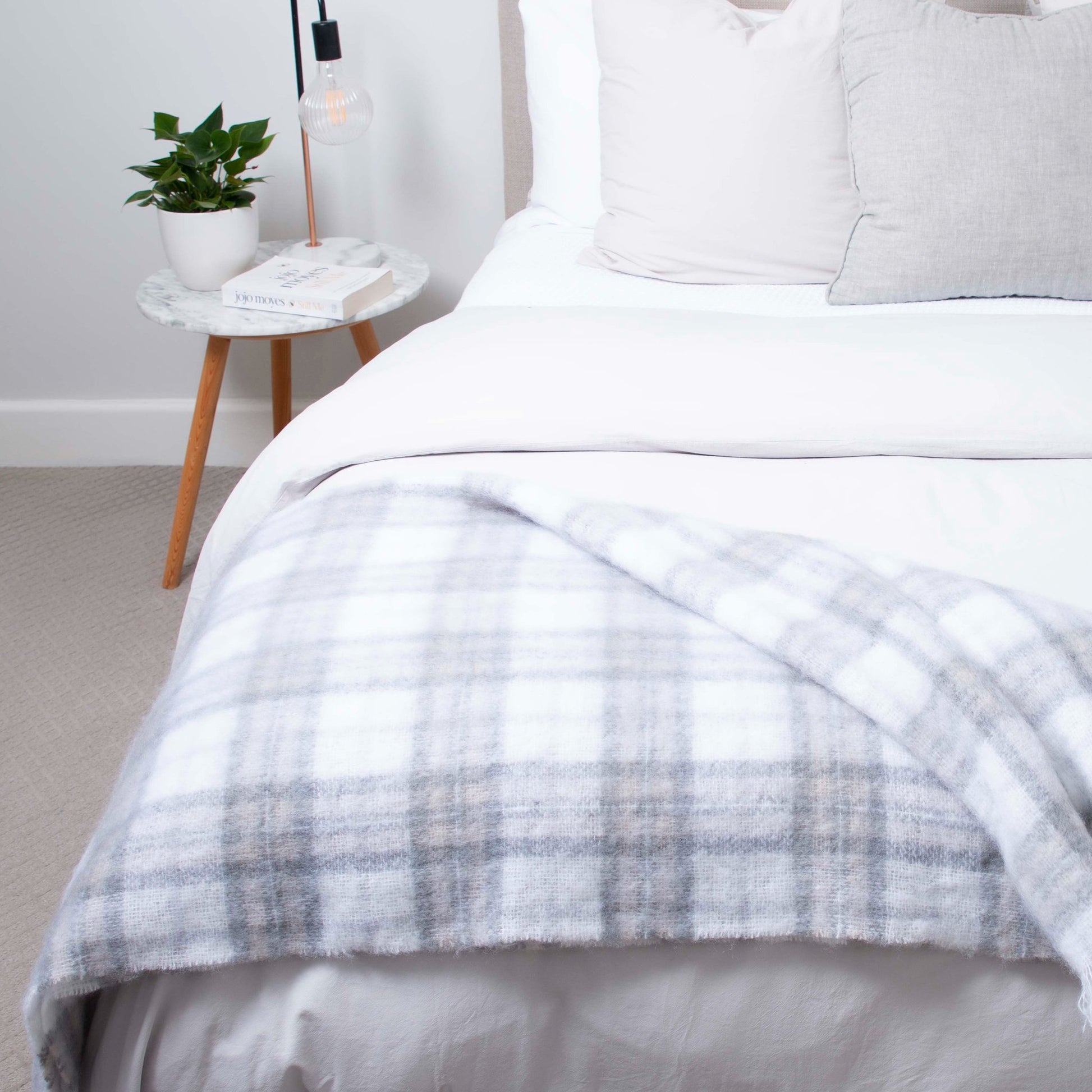 Soft Mohair luxury throws from Glamorous Goat.  Mohair throw in Tussock Tartan grey and white available at My Sanctuary