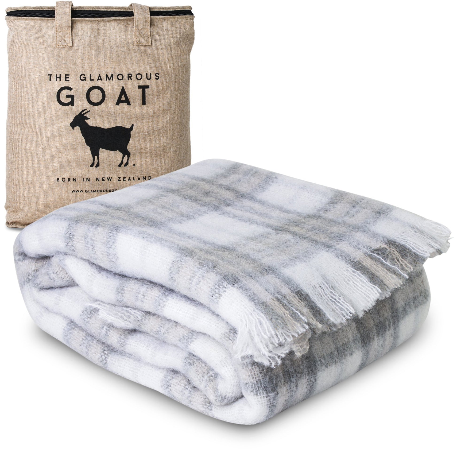 Soft Mohair luxury throws from Glamorous Goat.  Mohair throw in Tussock Tartan grey and white available at My Sanctuary