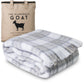 Soft Mohair luxury throws from Glamorous Goat.  Mohair throw in Tussock Tartan grey and white available at My Sanctuary