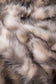 Imitation faux fur cushion in Mountain Hare