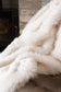 Luxury faux fur throw in pure white from Heirloom.  These are the best fake fur throws, super soft for NZ interior design