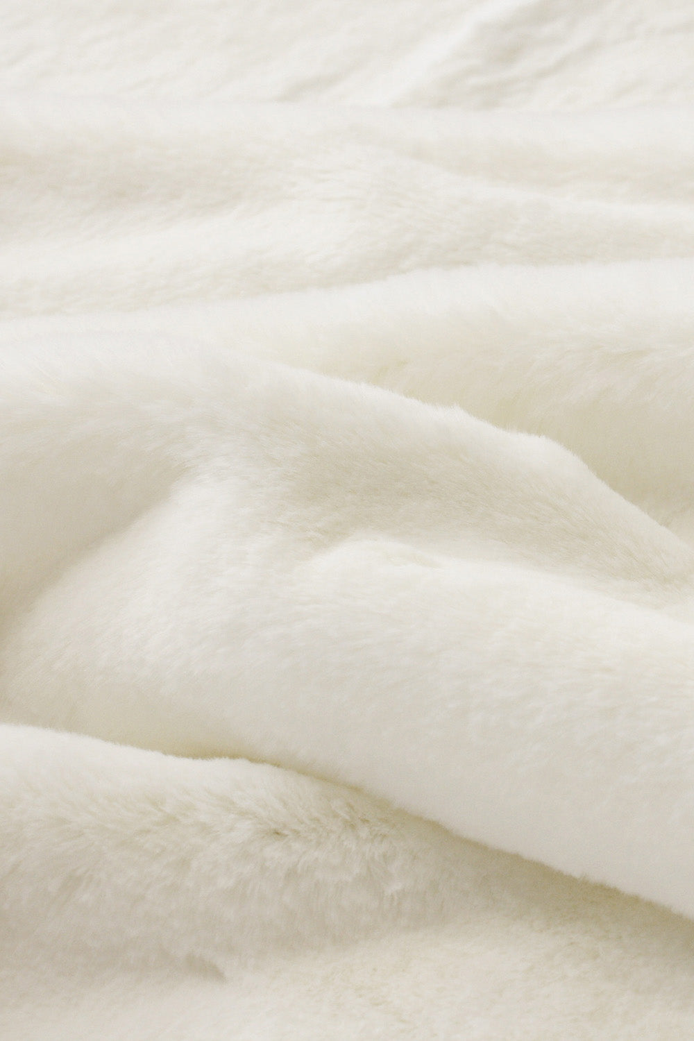 Luxury faux fur throw Polar Bear in pure white from Heirloom.  These are the best fake fur throws, super soft for NZ interior design