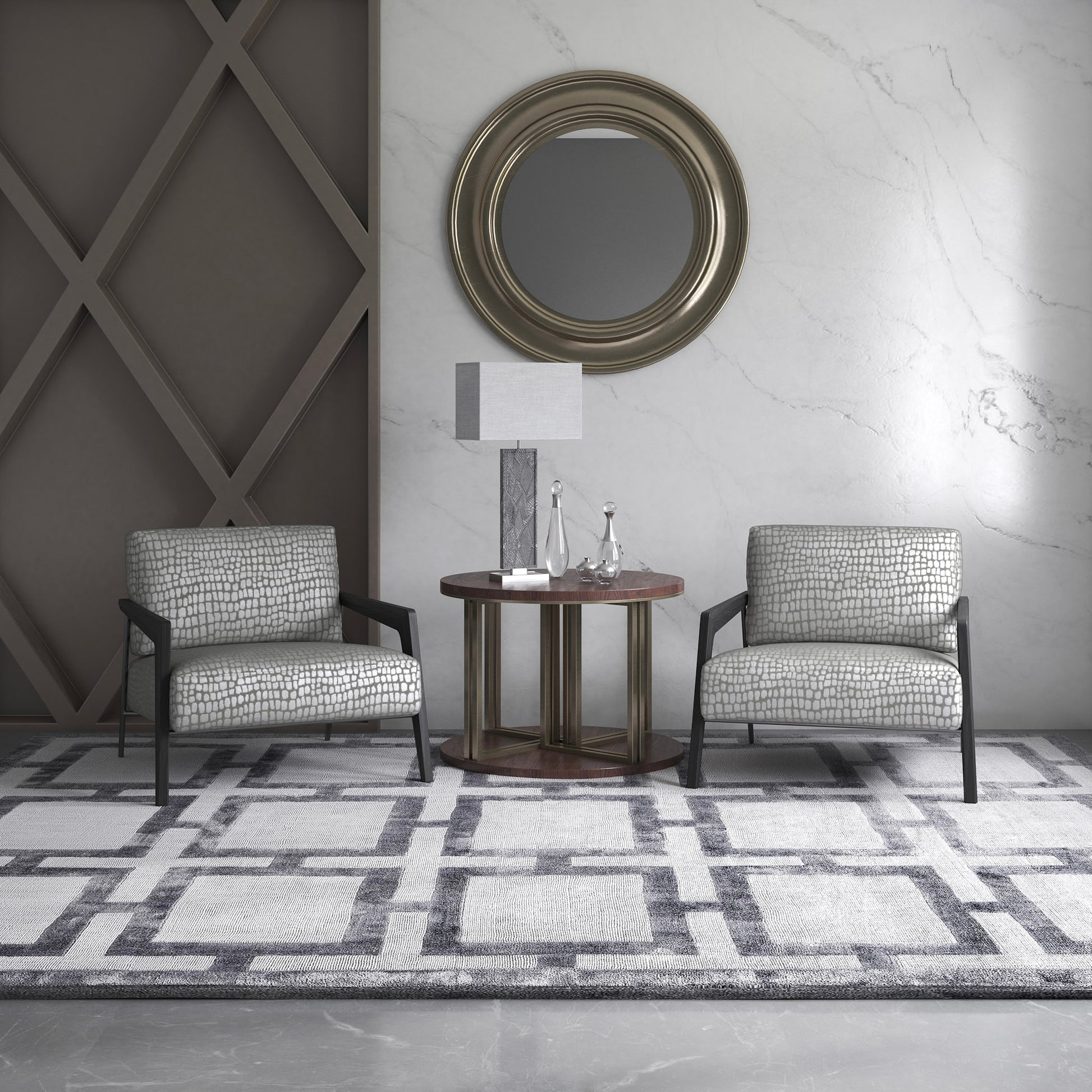 Cazador fabric part of the Sauvage collection shown on 2 ocassional chairs in a luxurious room with marble wall, geometric style rug and expensive looking wooden side table and mirror