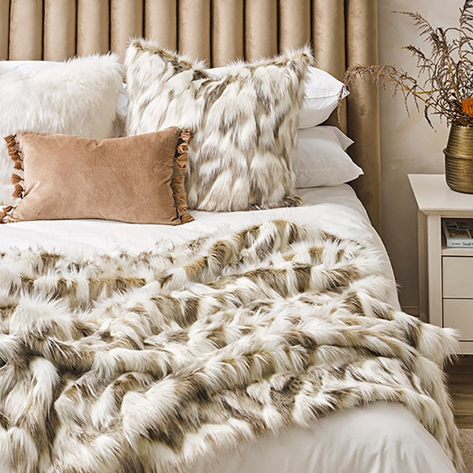 Luxury faux fur throw in cream and brown from Heirloom.  These are the best fake fur throws, super soft for NZ interior design. Snowhare. SKU: FSHT18