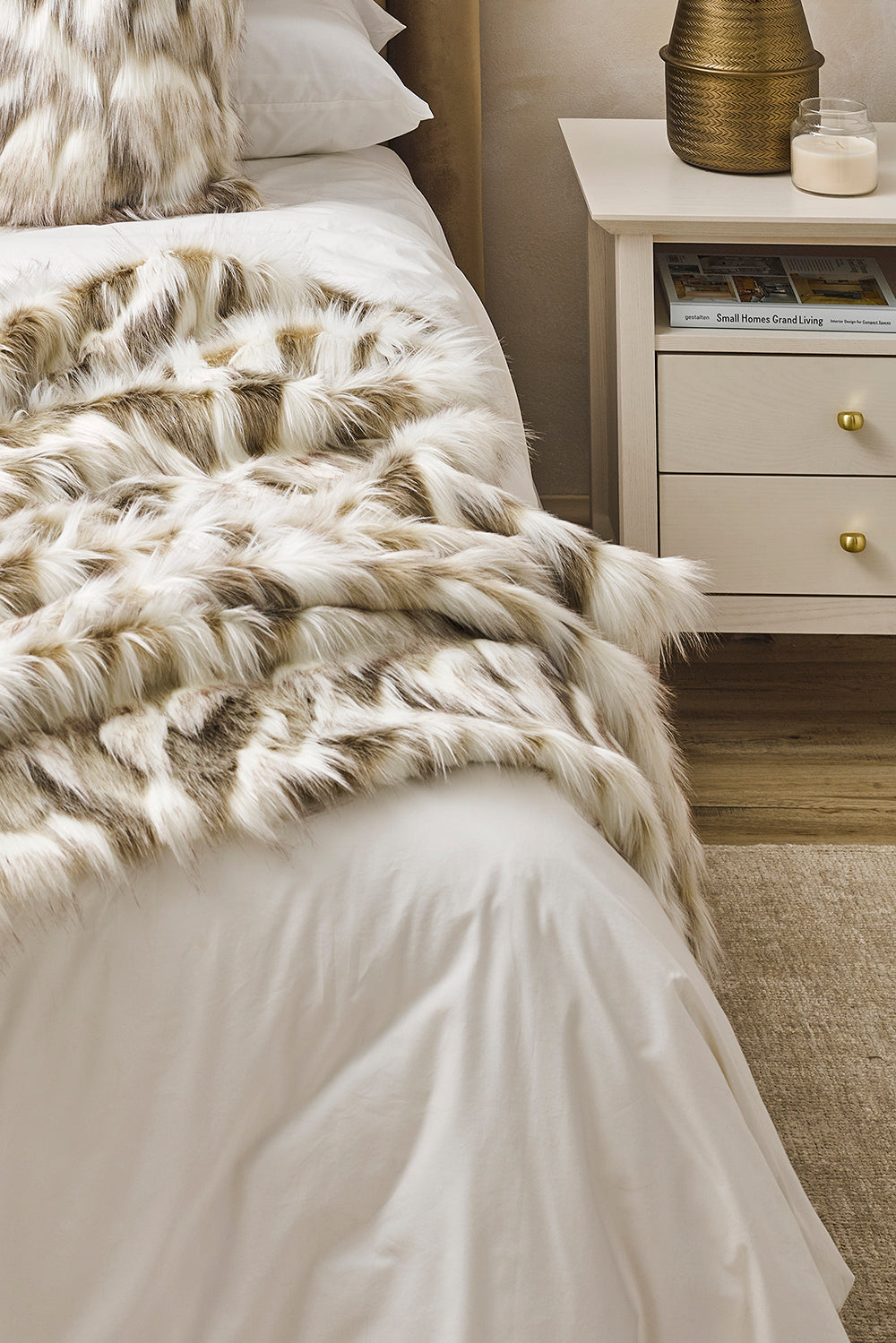 Luxury faux fur throw in cream and brown from Heirloom.  These are the best fake fur throws, super soft for NZ interior design. Snowhare.