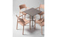 Nardi Trill Outdoor Armchair in Pink around a table