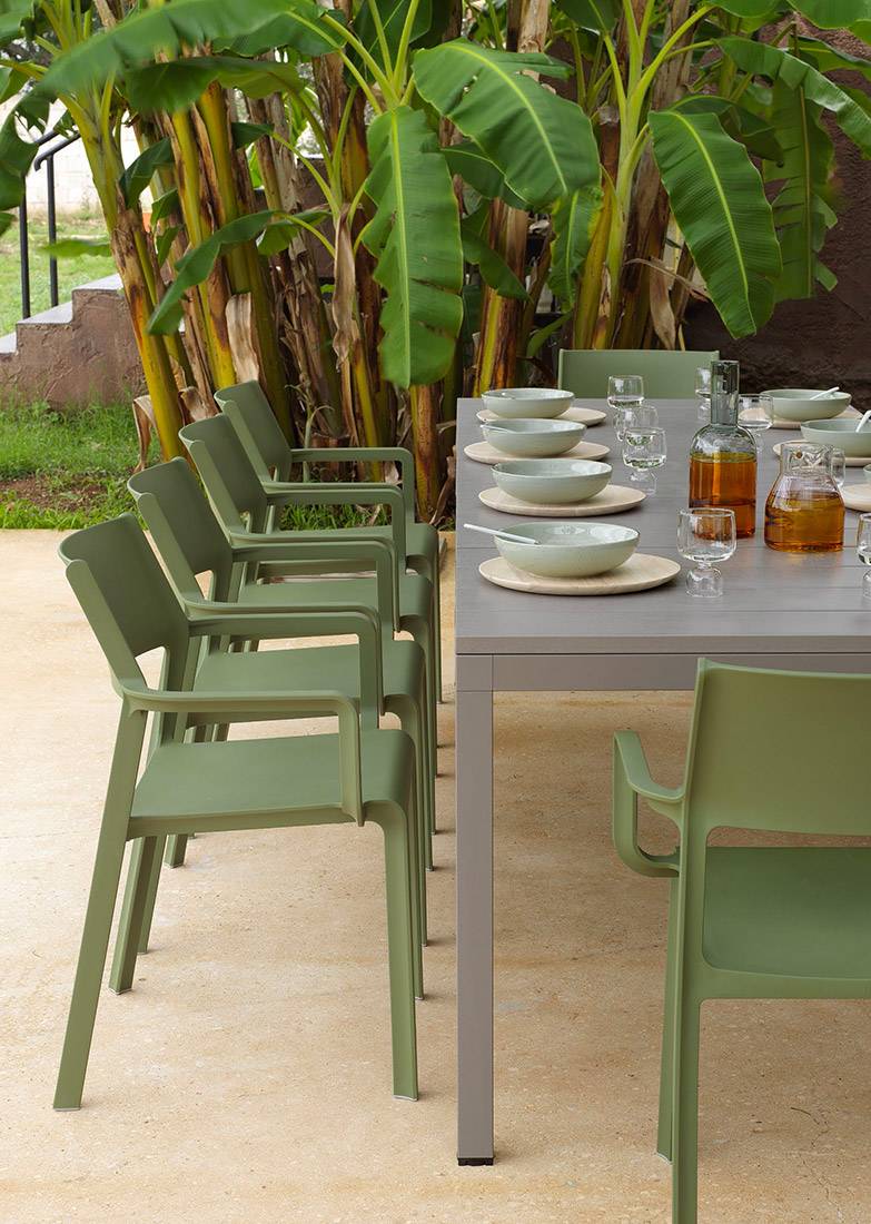 Nardi Trill Outdoor Armchair in olive green outdoor setting with table and setting