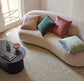 Ava cushion, velvet cushion from Weave Home, lifestyle shot with 4 coloured Ava cushions