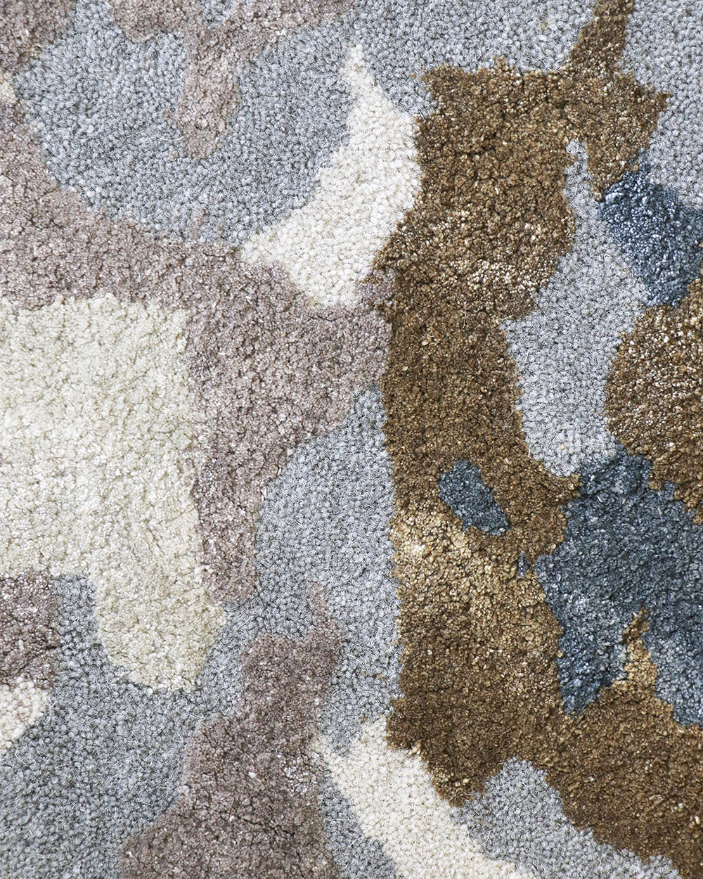 Fleur Multi Rug from Mulberi, abstract pattern of gold, greys, beignes and creams